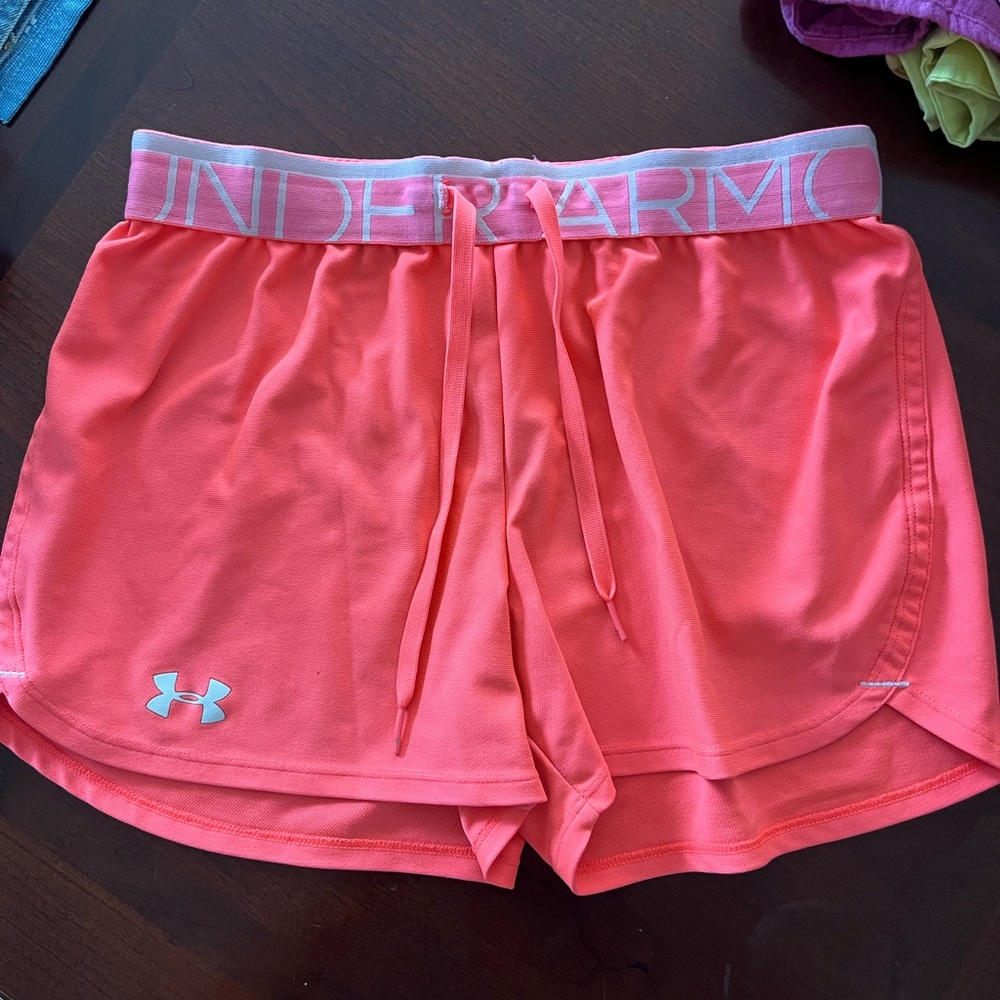 Bright pink under armour shorts. Size XS